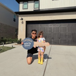 Meet some of the incredible residents  a man and a child holding a key